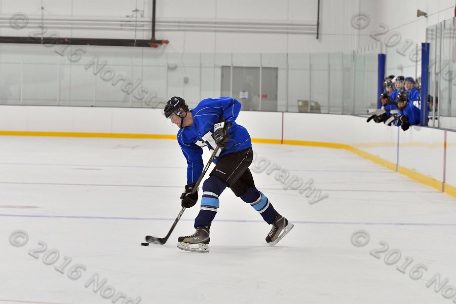 Wheaton College Men\'s Ice Hockey vs Middlesex Community College. - Photo By: KEITH NORDSTROM